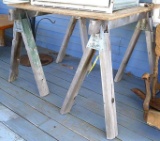 Pair of wooden saw horses, both about 40