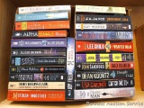Books by authors Lee Child, Dean Koontz, Lisa Gardner, Mary Higgins Clark, Julie Garwood, J.A. Jance