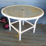 Glass topped patio table is about 43