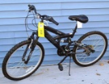Next PX4.0 Xelite mountain bike has Shimano Equipped gears. Back tire has some cracking but both