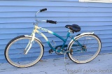 Laguna Mercury Classic Beach Cruiser bicycle features a Flex Frame, Kenda Aero Glide tires, bottle
