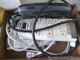 Two Phillips multi outlet power strips; Dynex outlet/coax/telephone connector box.