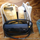 Two Phillips multi outlet power strips; CCI multi outlet power strip.