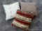 Three pretty throw pillows are all around 16