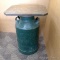 Ten gallon milk can labeled 