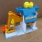 Fisher Price play family Lift & Load Depot is 15