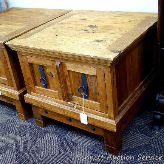 Unique heavy wooden 2 door storage cabinet is 26" x 23". Matches lot 130.