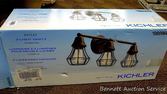 Kichler 3-light vanity fixture #0809666 is 23" long and is NIB.