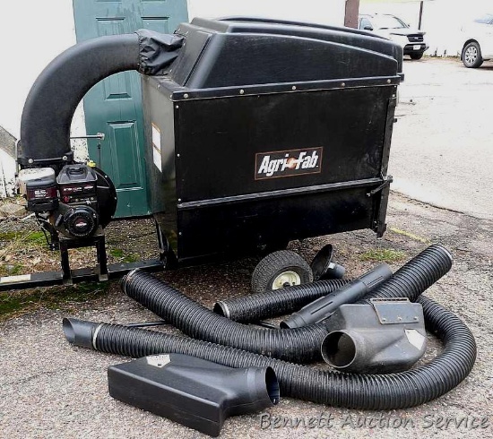 Agri Fab pull-behind lawn vacuum with chipper has a 6.5 HP OHV Briggs & Stratton engine with Intek