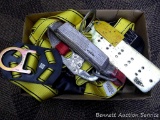 Parts for a safety harness.