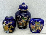 Pretty cobalt blue urn with matching vase and another smaller urn; largest urn measures 4-1/2