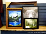 Framed and matted print of common loons on the Boundary Waters labeled 'Chased by the Light' by