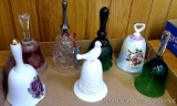 Nice collection of glass and porcelain bells, tallest is 6-1/2