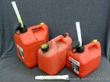 Three gas totes; largest measures 7