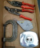 Klein Tools tape measure, Wiss aviation shears, Straight-Line chalk line, and a Billings C-clamp.