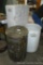Lockable barrel with wooden top and another barrel, plus a styrofoam cooler. Both barrels about 19