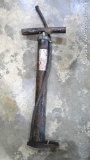 Antique metal bicycle tire pump is 20