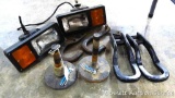 Two snow plow shoe assemblies similar to Western 49067; two plow lights, two recovery hooks and two