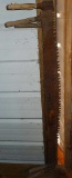 3 two-man crosscut saws. Longer are about 66