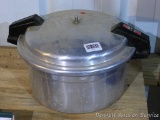Mirro 12 qt. pressure cooker with gasket and regulator.