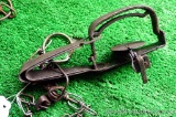 Triumph Super-Grip No. 1 leg trap has a double laminated spring and stamped double jaws. Patent date
