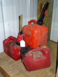 2.5 gallon gas tote; two 1 gallon gas totes.