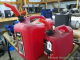 Two Briggs & Stratton gas totes are 6 gallon and 2.5 gallon, still have stickers.