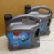 Two unused one gallon jugs of synthetic Mystek 2 cycle snowmobile oil.
