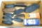 Assorted butt plates including one steel, three hard plastic and several rubber recoil pads. Two are
