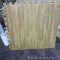 Two dozen foam interlocking tiles with wood look top. Each tile is 24