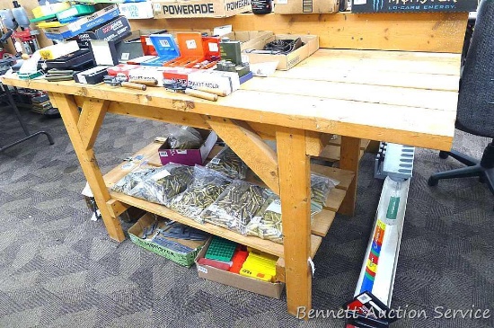 Nice wooden workbench is about 27" x 72" x 40" high overall. Matches the table in lot 19.