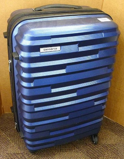Nice lockable rolling Samsonite suitcase is about 17" x 26" high overall and can be 10" or 12" deep.