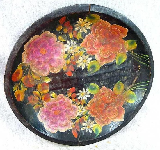 Hand painted wooden plate is 10-1/2" diameter. Seller's note states that this is mostly likely from