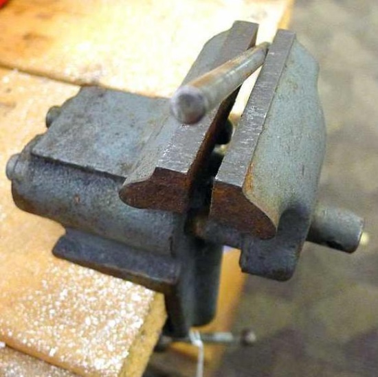 Cute little bench vise has 3" jaws and is only 8" as pictured.