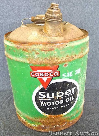 Vintage Conoco Super Heavy Duty Motor Oil was SAE 30. Stands about 16" tall.