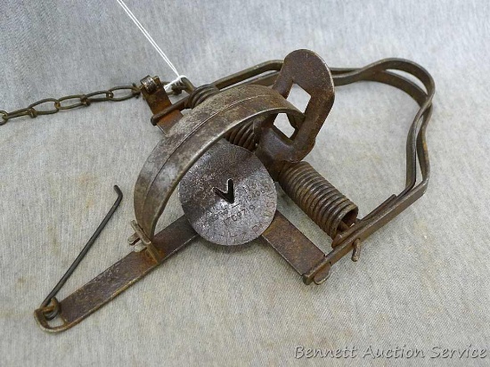 Victor ATC Two Trigger Stop Loss coil spring trap. Pan has good markings, chain is 13". Everything