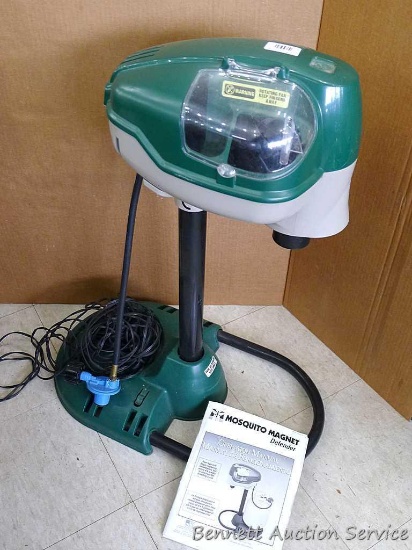 Mosquito Magnet Defender bug trap with manual and adaptor. Uses propane, and stands 31" tall.