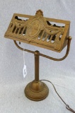 Unique anitque brass toned desk lamp; measures 11