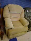 Ashley reclining rocker with arm that opens to a cup holder and remote for massage and heat;