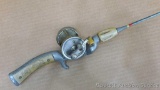 Stub-Caster steel fishing pole with an A.F. Meisselbach Takeapart 480 reel. Pole is about 51