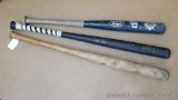 Three wooden bats. Louisville Slugger with Milwaukee Brewer and Coca-Cola emblems; Slasher softball