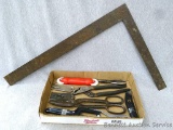 Stanley utility knife, 2' long square, tin snips, paint scrapers, pliers, more.