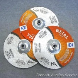 Three depressed center metal grinding wheels have a 7/8