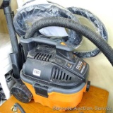 Ridgid 4 gallon, 5 HP portable vac with hose and attachments is 18