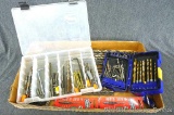 Large collection of drill bits and screw driver bits.