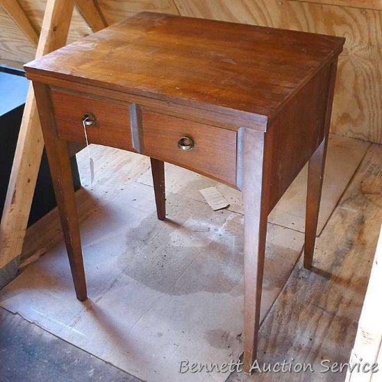 Pretty sewing machine cabinet would also make a nice side table. Stands about 25" x 20" x 31" high.