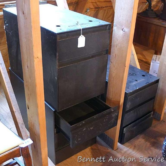 Three metal cabinets, may go with desk in lot 147. All about 15" x 19" x 28" long. Located upstairs,