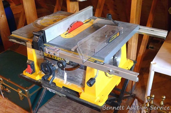DeWalt table saw on a DeWalt stand. Saw runs and is Model DW744, has a 10" blade. Nice saw with Rack
