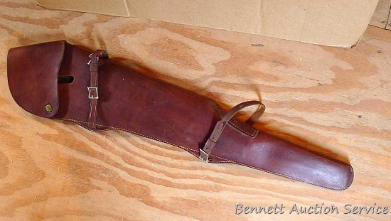 Nice leather rifle scabbard is 39-1/2" long overall, 9" at widest. Located upstairs, please bring