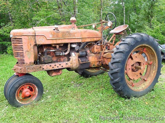 IH Farmall Model M tractor with very good tires. Seller drove the tractor to where it sits, but now